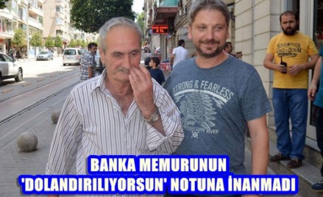 Banka Memurunun 'Dolandırılıyorsun' Notuna İnanmadı