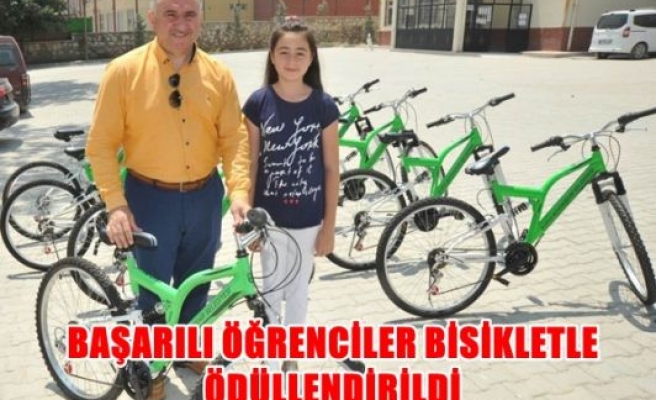 Başarlı öğrenciler bisikletle ödüllendirildi