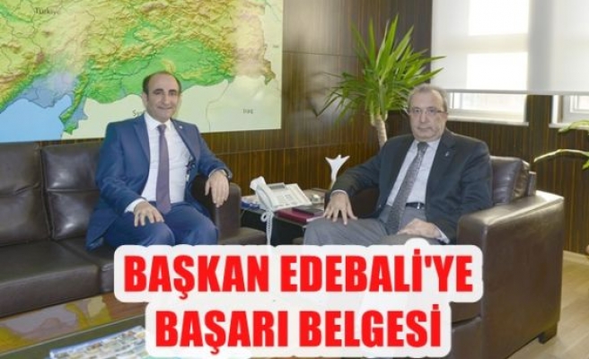 Başkan Edebali’ye başarı belgesi