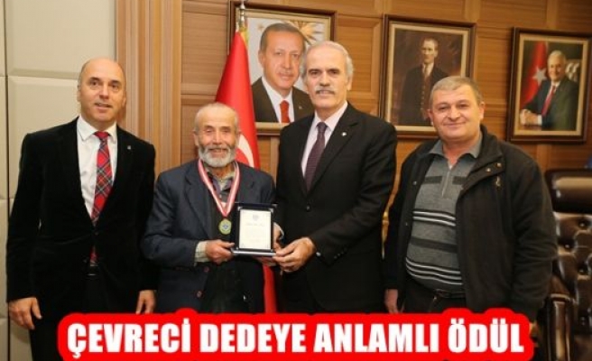 Çevreci dedeye anlamlı ödül