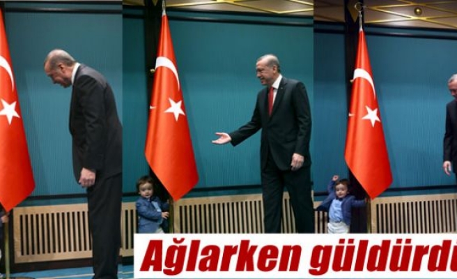 Erdoğan, çocukların ellerini öptü