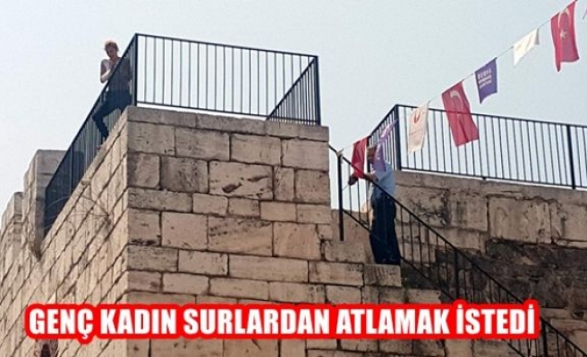 Genç kadın surlardan atlamak istedi