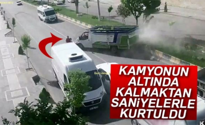 Kamyonun altında kalmaktan saniyelerle kurtuldu