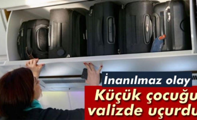 Küçük çocuğu valizde uçurdu