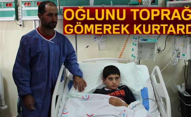 Oğlunu toprağa gömerek kurtardı