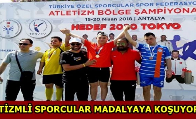 OTİZMLİ SPORCULAR MADALYAYA KOŞUYOR