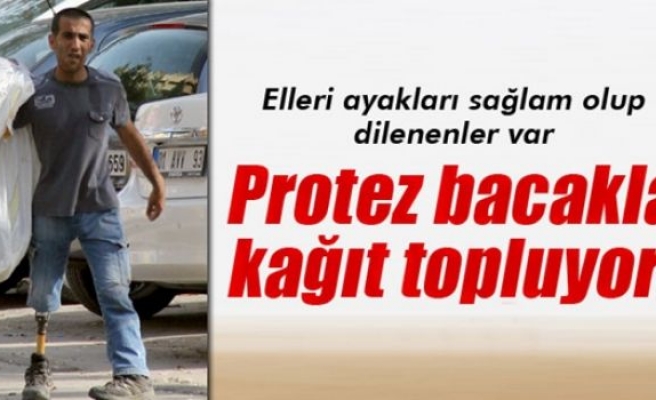 Protez bacakla kağıt topluyor