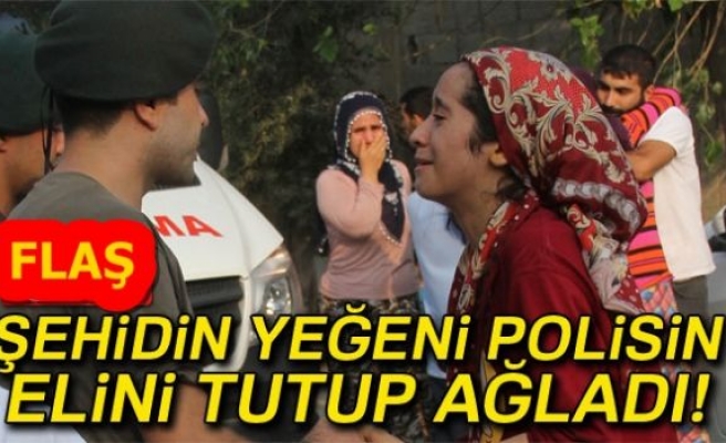 ŞEHİDİN YEĞENİ POLİSİN ELİNİ TUTUP AĞLADI!