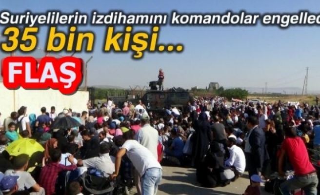 SURİYELİLERİN İZDİHAMINI KOMANDOLAR ÖNLEDİ!