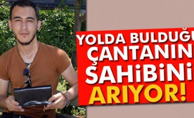 Yolda bulduğu çantanın sahibini arıyor