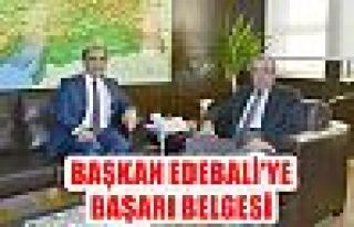 Başkan Edebali’ye başarı belgesi