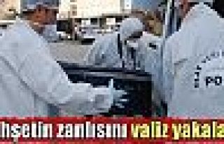 Vahşetin zanlısını 'valiz' yakalattı